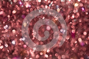 pink abstract glitter bokeh lights. defocused. Lilac background.