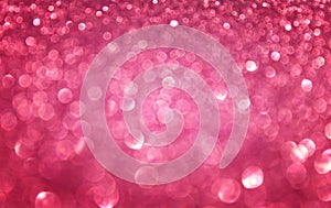 Pink abstract glitter bokeh lights. defocused lights background.