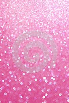 Pink abstract glitter bokeh lights. defocused lights background