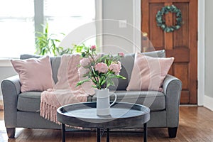 Pink accents in the living room for Spring