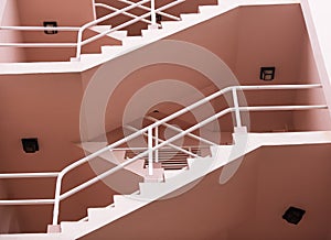 a pink apartment building staircase in southern Fl