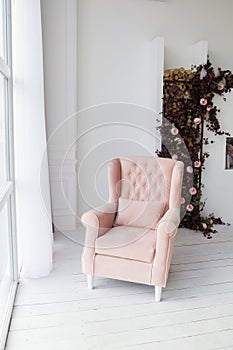 Pink armchair in living room