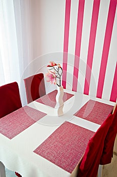 Pink artificial flower as room decoration
