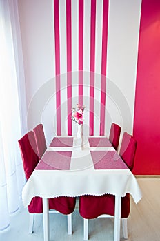 Pink artificial flower as room decoration