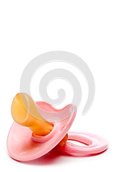 a pink baby pacifier photo