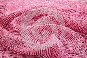 Pink background luxury cloth or wavy folds of grunge silk texture satin velvet