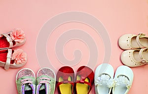 Pink background for newborn babies with shoes