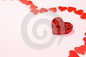 Pink background with red hearts. Space in heart for text or message. Pattern with red hearts, greeting card, wishes card