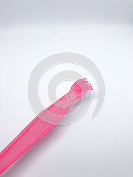 pink backscratcher and massage tool