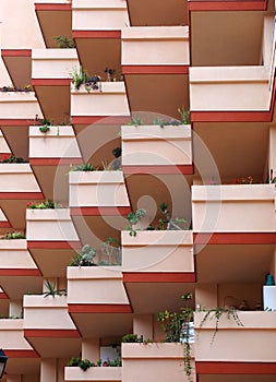 Pink balconies on modern apartment building