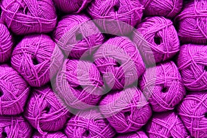 Pink Ball of wool. Beautiful colored wools ball. Wool texture. Skeins of yarn. Natural material for knitting, creative