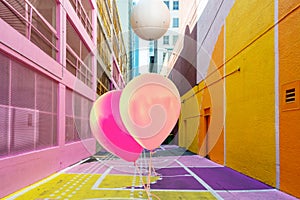 Pink balloons in Alley Oop, a colorful alley in Vancouver BC Canada photo