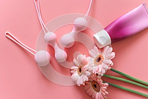 Pink balls for special exercises for woman. Balls for intimate muscles of women. Kegel balls