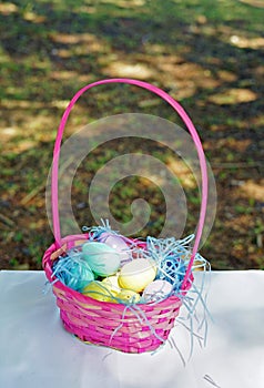 Pink baskets filled with Easter eggs