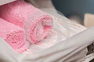 Pink bath towels in the drawers