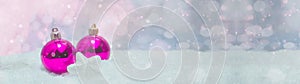 Pink baubles and star on snow snowflakes - Christmas winter background banner long