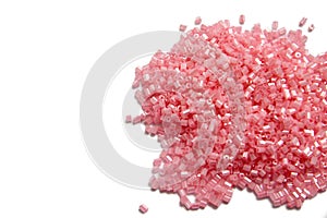 Pink beads for craft on isolated background