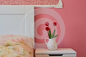 pink bedroom with flower,interior of a girl\'s bedroom with tulips, a room for rest and sleep