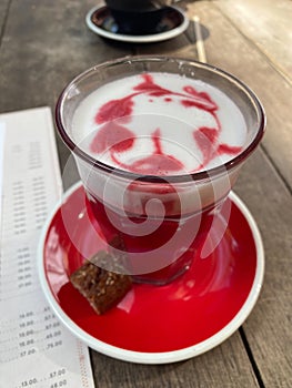 pink beetroot latte with foam. Vegetable drink