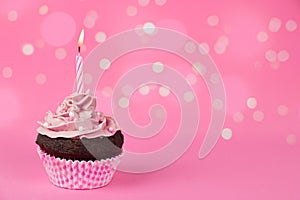 Pink birthday cupcake with lights