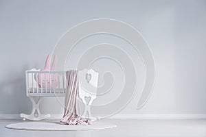 White baby`s bedroom with cradle photo