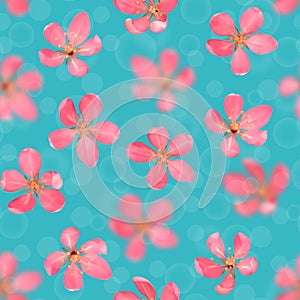 Pink blossoming cherry with bokeh effect seamless pattern