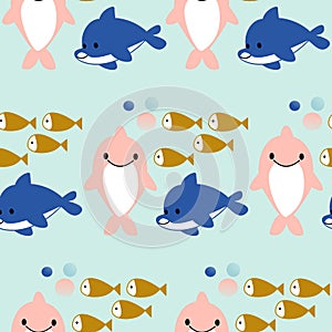 Pink and blue dolphines and fishes in a seamless pattern design