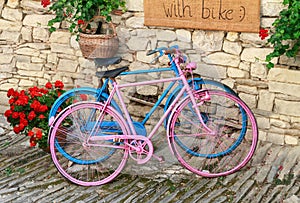 Pink and blue old bicycles