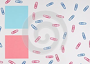 Pink and Blue Paper Clips with To-Do Notes on White Background. Copy Space Include