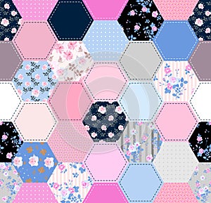 Pink and blue patchwork. Seamless pattern from hexagonal patches with flowers. Fashion design for fabric
