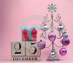 Pink and blue theme Save the Date calendar for Christmas Day, December 25.