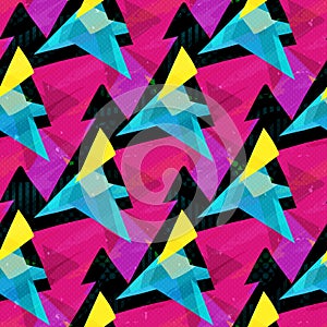 Pink blue and yellow triangles on a black background seamless pattern