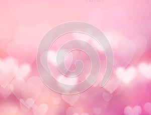 Pink blurred hearts background. Valentine`s day texture. Soft blur