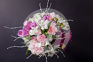 Pink bouquet from gillyflowers and alstroemeria on blackboard, t