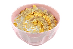 A pink bowl of cereal, corn flakes and fresh milk