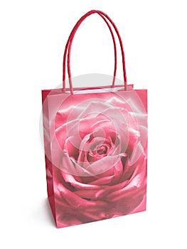 pink brightly colored shopping bag isolated over a white background