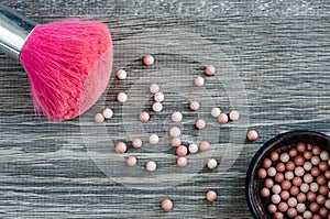 Pink brush for make-up and powder balls