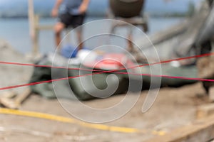Pink builders string-line closeup on constructions site in selective focus