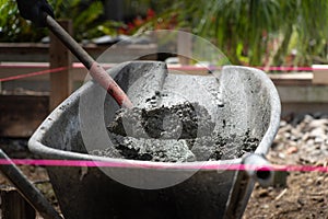 Pink builders string-line closeup on constructions site in selective focus
