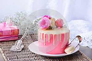Pink cake and present