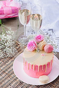 Pink cake and sparkling wine