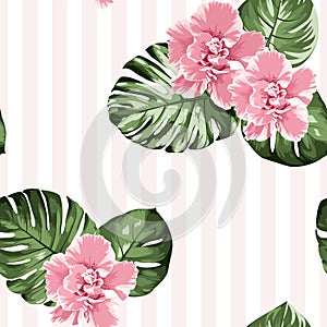 Pink camelia flowers green monstera leaves on vertical stripes background. Exotic tropical floral seamless pattern.