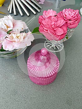 Pink Camellia Flowers and pink jar