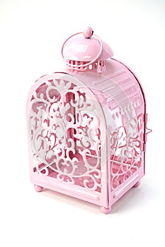 Pink candle light lantern home decoration on white background