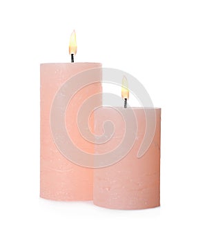 Pink candles with wicks isolated