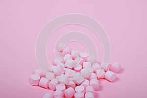 Pink Candy Lollies on a Pink Background