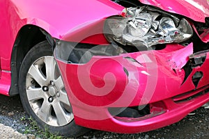 Pink car accident damaged to headlights front, broken headlights car crash accident, damaged automobiles after collision of pink