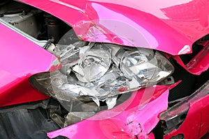 Pink car accident damaged to headlights front, broken headlights car crash accident, damaged automobiles after collision of pink c
