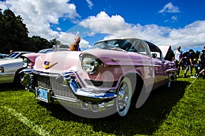 Classic Pink Cadillac at a Vintage Car Show â Whitewalls, Chrome, Tailfins (Editorial)