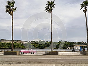 Pink car in the city